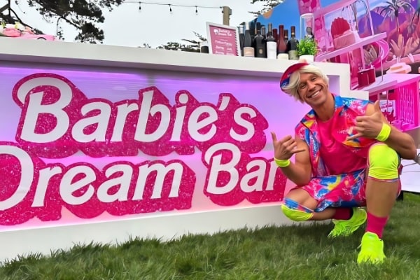 Barbie Dream Bar sign with Ken in front